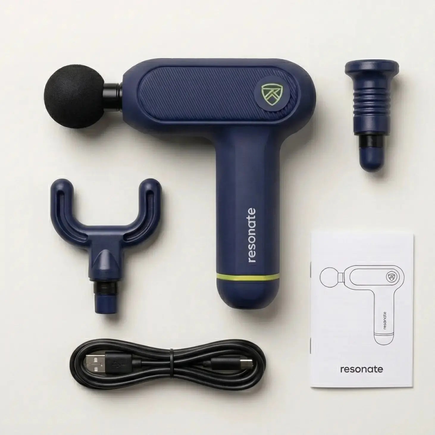 Resonate Aura massage gun with 4 heads round flat bullet fork